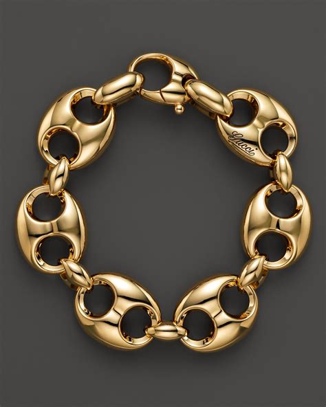 gucci gold wrist braclet|is Gucci jewelry real gold.